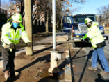 workers using fire hydrant tool