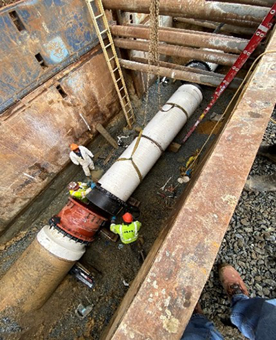 PCCP being installed to replace existing pipe