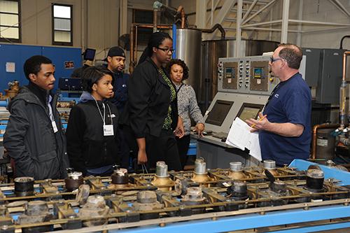 plant tour demonstrating equipment