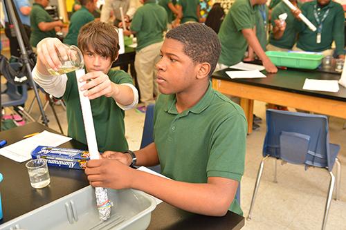 Fats Oils and Grease Program - student learns about the problems