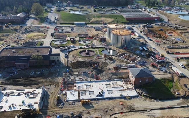 On the bottom left corner is the Cake Storage Building.  The floor slab is completed and the walls are going up.  This is where the final Class A biosolids product will be stored before it’s trucked off-site.  To the right of that is the Solids Dewatering Building with the floor slab almost finished.  This month they will be building the pier support structures in this building that will support the dewatering equipment.