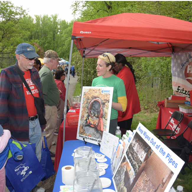 Environmental Coordinator talking to a customer about canning the grease
