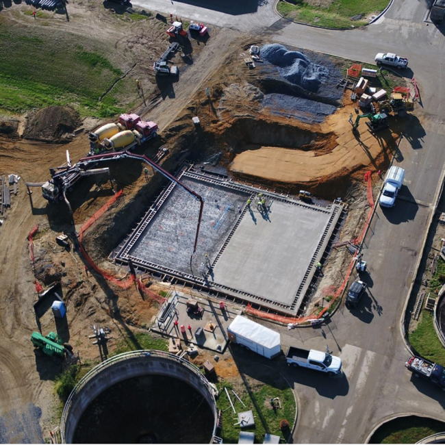 Here the Contractor is pouring the slab on the Sidestream Treatment Building.  The smaller building in the top right corner of the photo will be the Sidestream Chemical Storage Building 
