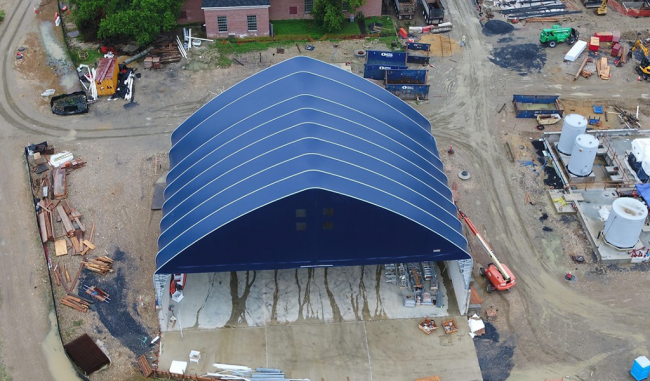 A close up shot of the Final Cake Storage facility adorned with its new blue canopy.  