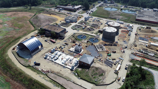 To the right of the Cambi equipment  work is ongoing for the concrete slab that will support the Cake Silos.  These silos will store the sludge material that is delivered from the other WRRFs.  From the silos, the material will be fed into the Cambi process.