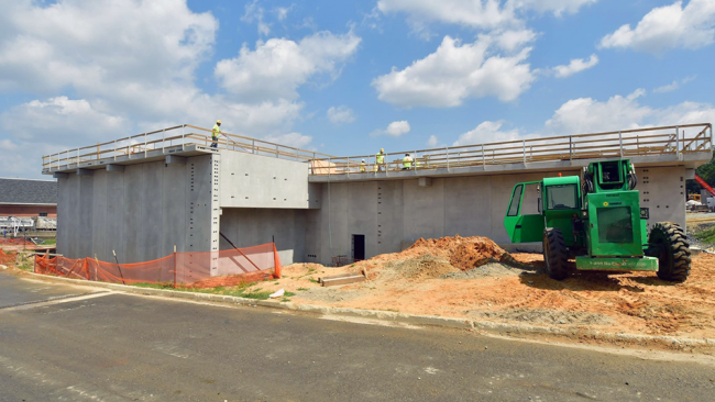 This fine example of finished concrete work is the Side Stream Treatment Tank.  Here the nitrogen will be removed from the liquids that are squeezed out of the biosolids through the belt filter presses in the Solids Building.