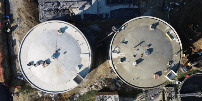 Aerial view looking down on the top of the Digesters.  