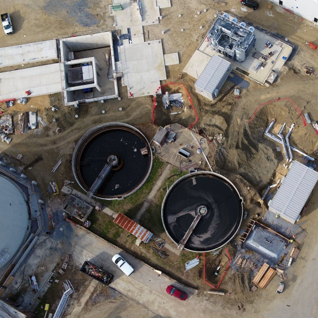 In the center of this picture, the excavated area where the pipeline construction is underway will be where the Heat Exchanger goes.  The Heat Exchanger is used in the Thermal Hydrolysis Process.