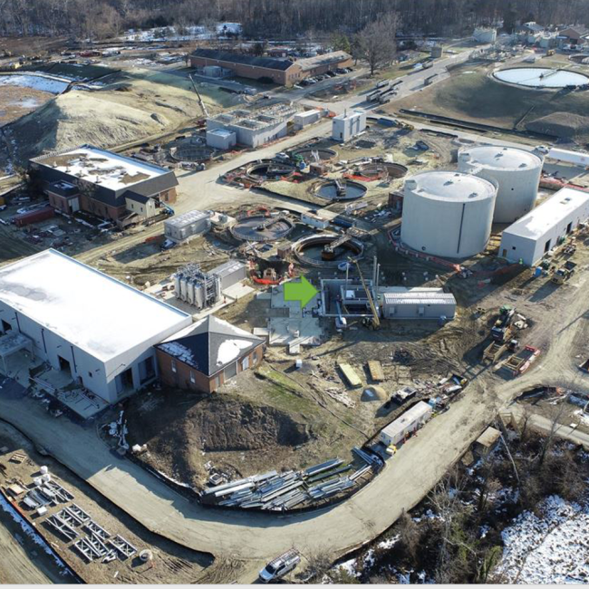In the center of this photo you can see the crane in place erecting the superstructure that will support the Cake Receiving Facility.