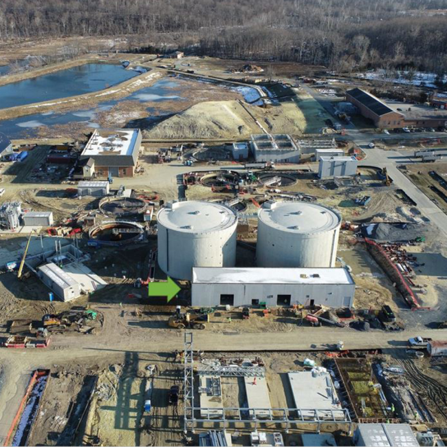 In the center of the photo is the Digester Control Building.  It will contain the electrical and mechanical equipment that will control the process flow through the two Anaerobic Digesters.