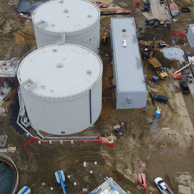 Aerial view of the Anaerobic Digesters and the Digester Control Building to the right.