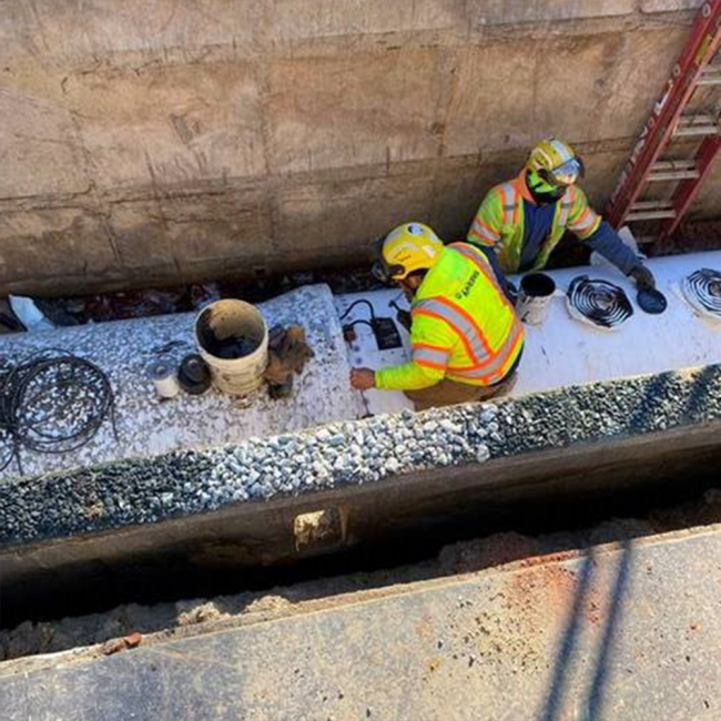 finishing welding wires for cathodic protection and applying filler Tape around the joint, The joint is then wrapped with 2 layers of Polyken Wrap Tape.