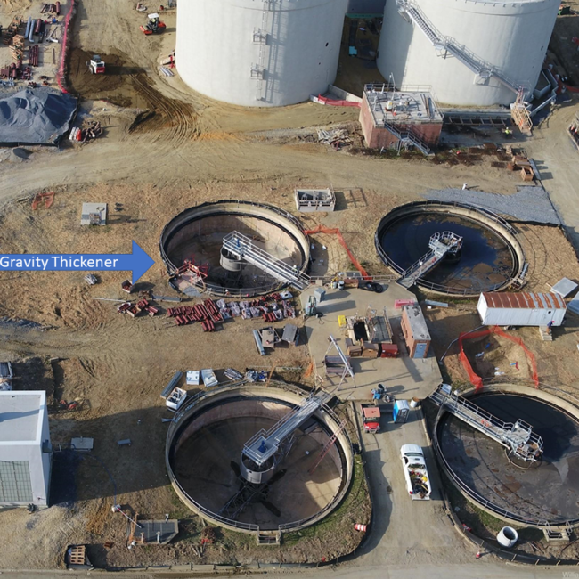 These four tanks are Gravity Thickeners that were in place before the Bioenergy Project.  They play a role in the separation of the solids from the liquids in the sludge processing.  