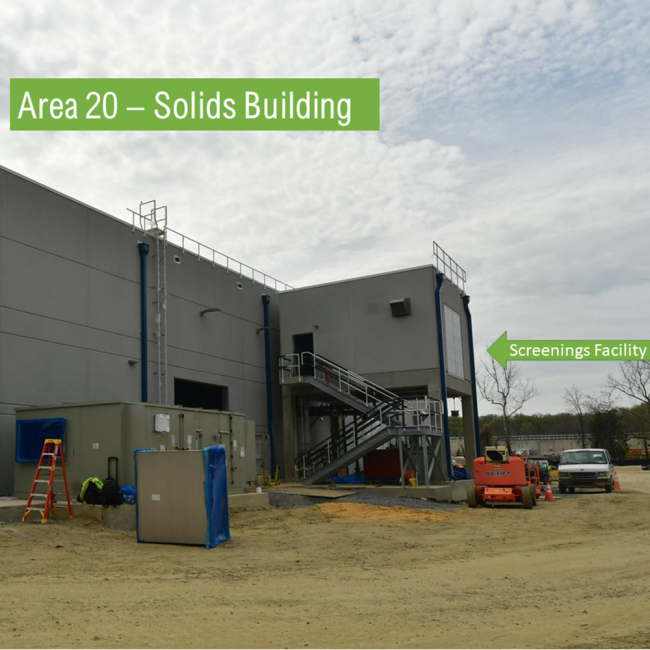 This is the back side of the Solids Building where the Screenings Facility is located.  On the Screenings Facility the roof construction has been completed, the top railing and stairs are in place.  The screening equipment inside will soon be installed in place.
