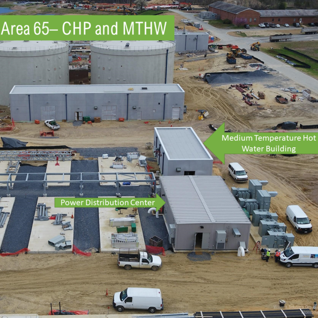 This is a good photo of the stonework that has been placed between the boiler pads and the generator pads.  The stonework was a “compromise” solution between paving the entire area or grassing it.