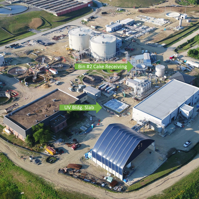 The slab has just been poured for the UV Treatment Building.  It’s covered in this photo to facilitate proper curing.