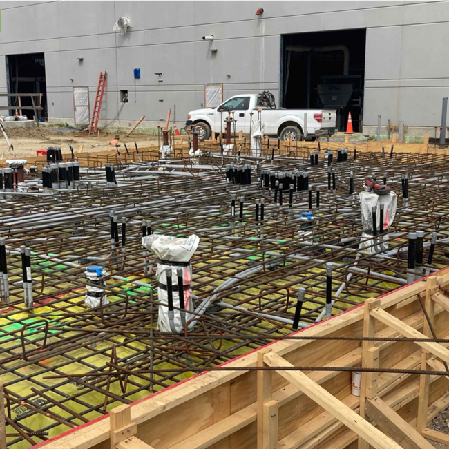 Here the steelworkers are setting the slab reinforcement in preparation of the concrete pour for the UV Treatment Building slab.