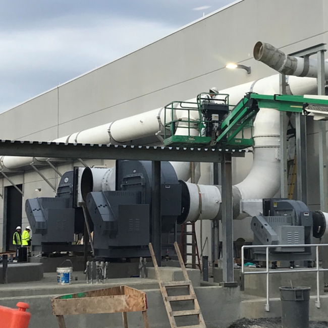 At the southeast corner of the Solids Building, this is the Odor Control equipment.  The three grey units are the blowers.