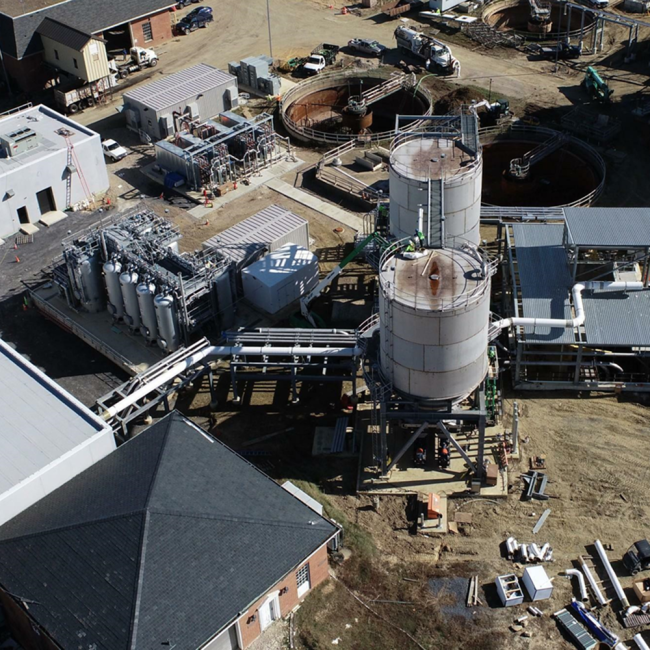 Aerial view of the Cake Receiving Facility.  Ductwork and piping under construction.