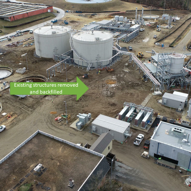 Aerial view shows recent demolition work next to the digesters and cake receiving area.