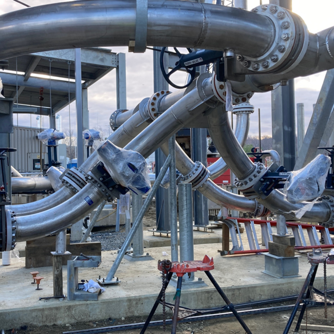 Aerial view shows recent demolition work next to the digesters and cake receiving area.