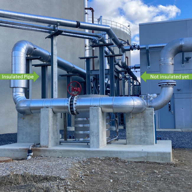 The piping on the north side of the Digester Building shown here with the insulation recently added.