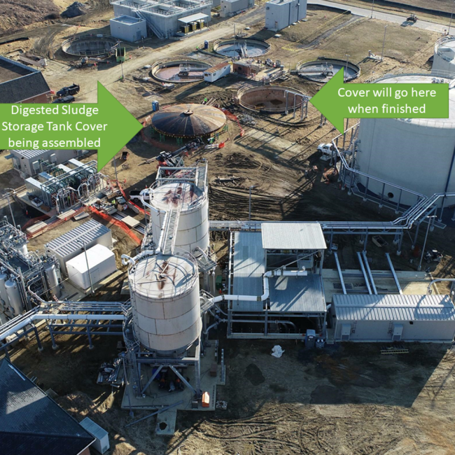 Overhead view of the Cake Receiving Facility.  Also highlighted is the construction of the Digested Sludge Storage Tank Cover and its final location.