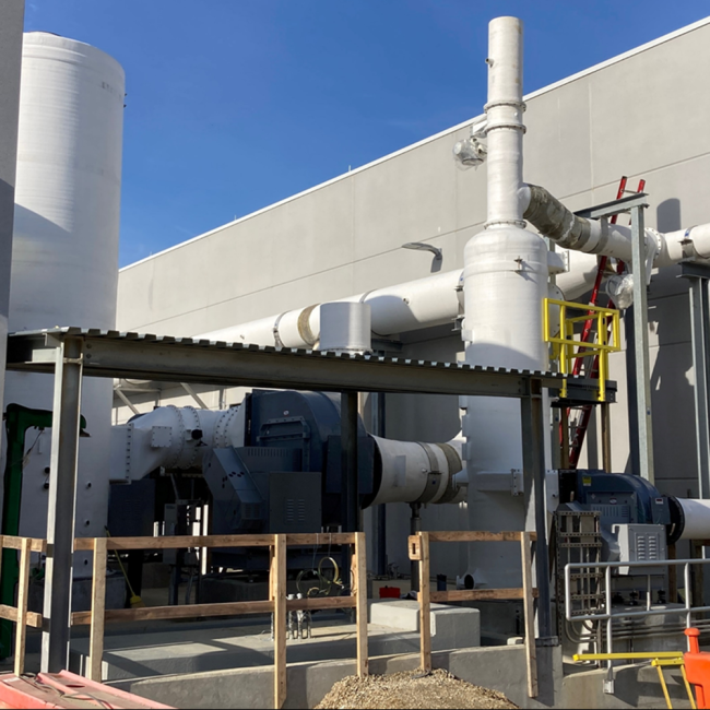 Odor Control Equipment and Piping fully assembled next to the Solids Building