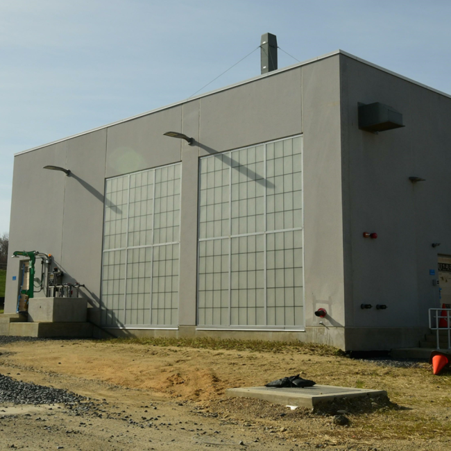 The Chemical Storage Building at the Sidestream Treatment area is closed in now with the completion of the roll-down doors.