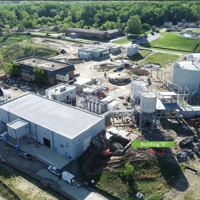 The old Dewatering Building, Building “A”, which is next to the new Solids Building, is finally being demolished.  Until recently the electrical gear inside this building was serving as a power source for construction activities.