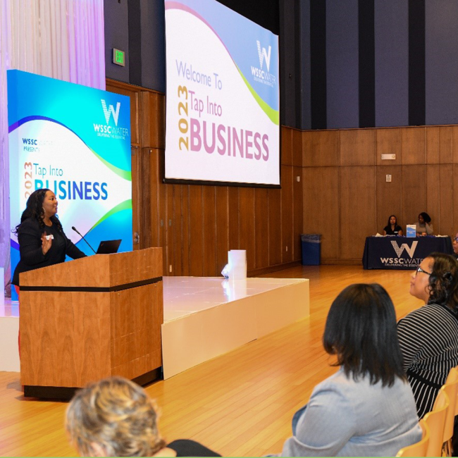 Courtney Edmonds, Director of Office of Supplier Diversity & Inclusion, opening the 2023 Tap Into Business Event.
