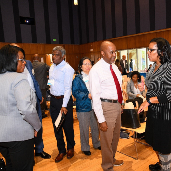 General Manager Kishia Powell speaking with attendees.