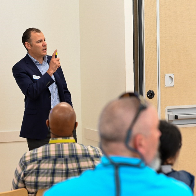 Jorge Rodriguez, Acting Director of Utility Services, discussing upcoming projects in a breakout session
