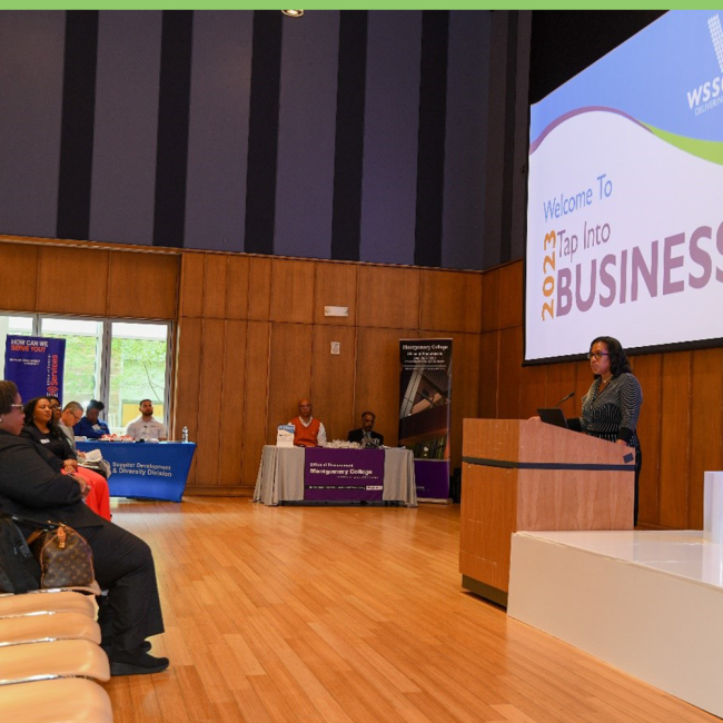 General Manager Kishia Powell opening the 2023 Tap Into Business Event.