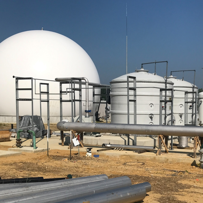 The Gas Storage Bubble on the left.  The large pipe in the foreground will be bringing digested gas from the Anaerobic Digesters.