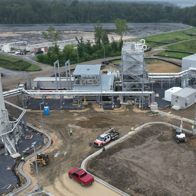 Aerial view of the Cake Receiving and Solids Building area being prepared for paving.