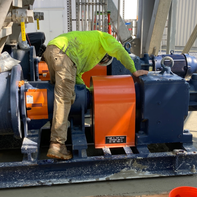 Constructing the pump pads next to the Cake Bins at the Cake Receiving Facility.