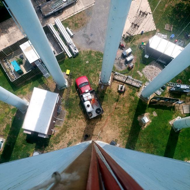  View of temporary construction equipment and facilities from top of tank including; field construction office, dust collection equipment and other miscellaneous items.