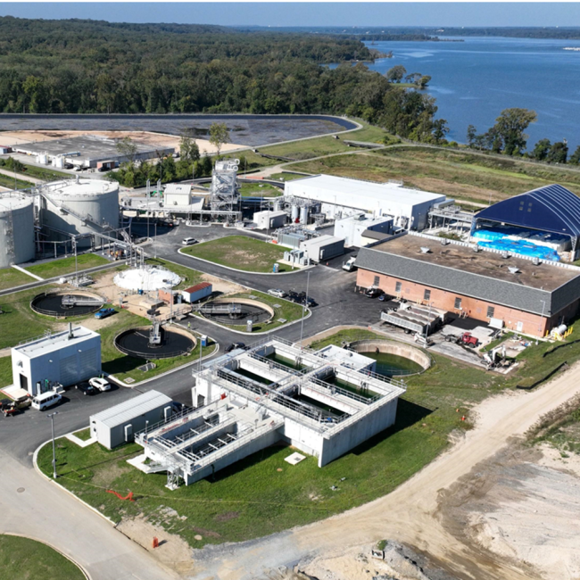 Aerial photo taken this week shows the new pavement going in and the beginning of vegetation restoration.