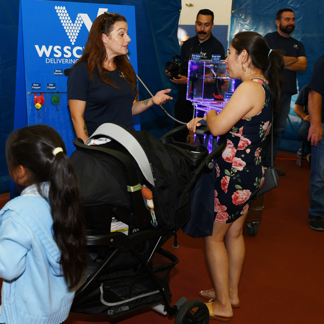 Christin Poole sharing information about toilet flushing and saving water