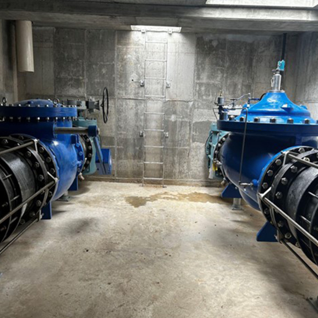 The altitude, check, and plug valves have been installed inside the Altitude Valve Vault. The check valve and altitude valve work together to fill the tank and release water when there is demand.