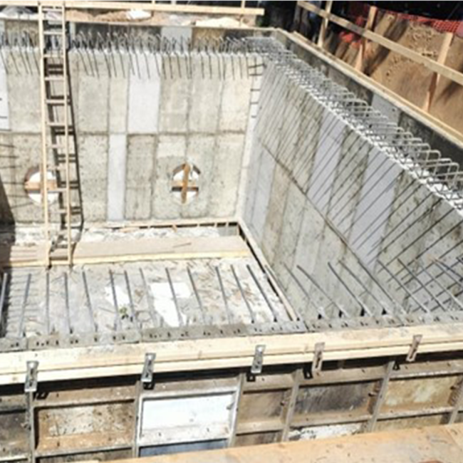 The new concrete walls of the Altitude Valve Vault have been set, and we've removed the forms from the inside. The exterior forms will be removed soon. The pipes will be installed in the two (2) openings in the wall.