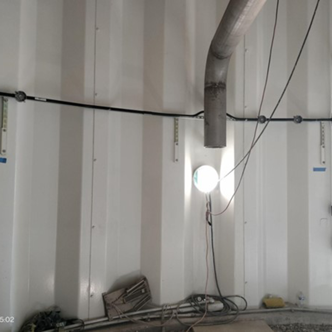 Lighting Installation Brackets and conduits are being installed to add lighting inside the tank column.